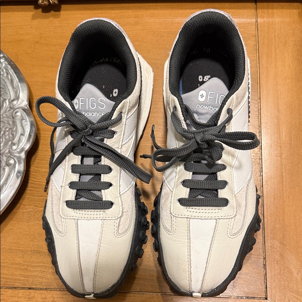 FIGS 
New Balance  Off-White and Black Sneakers 5.5 Men 7 Women